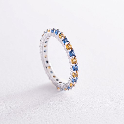 Кольцо с дорожкой голубых и желтых камней (белое золото) 815б