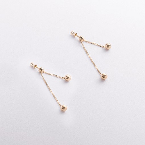 Серьги - пусеты с шариками на цепочке (желтое золото) 580142м