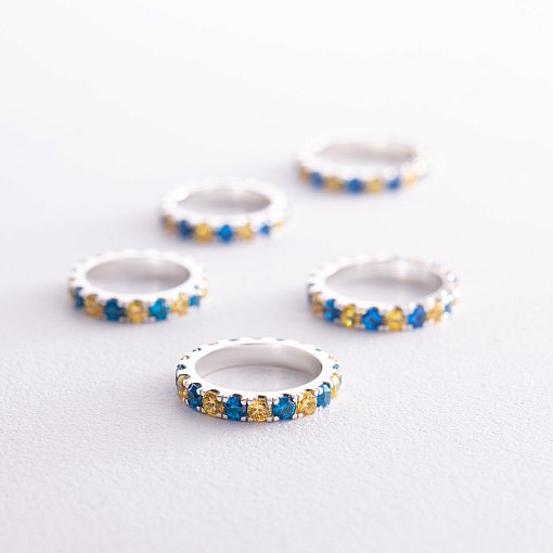 Серебряное кольцо с дорожкой голубых и желтых камней 112664 4