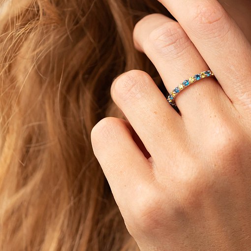 Серебряное кольцо с дорожкой голубых и желтых камней 8151 8