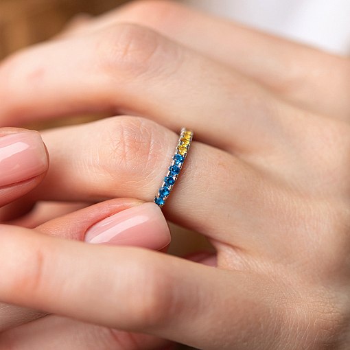 Серебряное кольцо с дорожкой голубых и желтых камней 8152 4