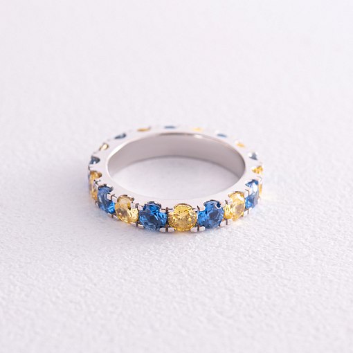 Кольцо с дорожкой голубых и желтых камней (белое золото) к07108 11