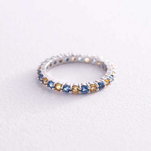 Кольцо с дорожкой голубых и желтых камней (белое золото) 815б 2