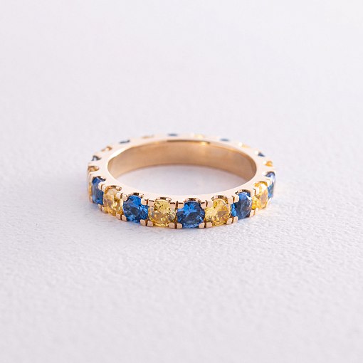 Кольцо с дорожкой голубых и желтых камней (желтое золото) к07106 9