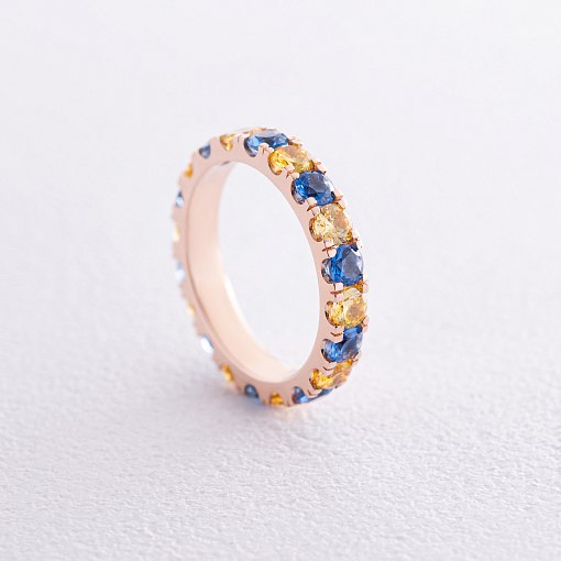 Кольцо с дорожкой голубых и желтых камней (красное золото) к07107