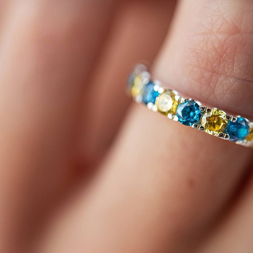 Серебряное кольцо с дорожкой голубых и желтых камней 112664 13