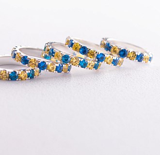 Серебряное кольцо с дорожкой голубых и желтых камней 112664 №5