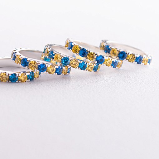 Серебряное кольцо с дорожкой голубых и желтых камней 112664 5