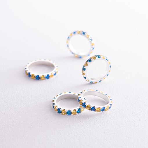 Серебряное кольцо с дорожкой голубых и желтых камней 112664 3
