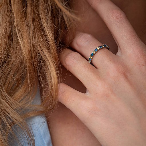 Серебряное кольцо с дорожкой голубых и желтых камней 8151 5